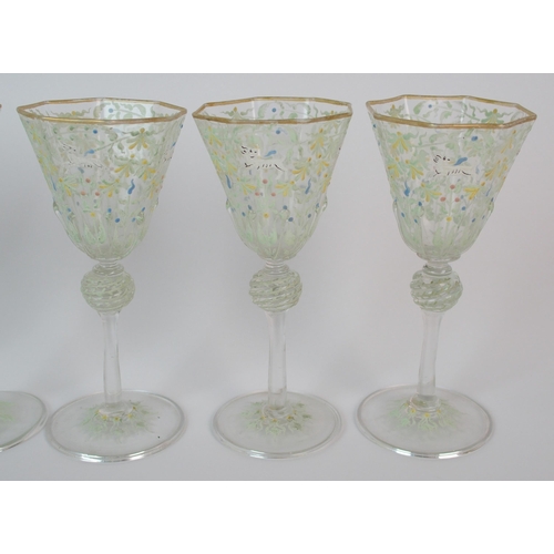 454 - A set of six facon de venise octagonal wine glasses