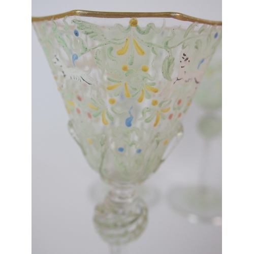 454 - A set of six facon de venise octagonal wine glasses