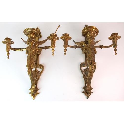 463 - A pair of brass wall sconces