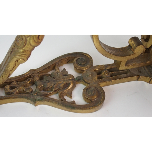 463 - A pair of brass wall sconces