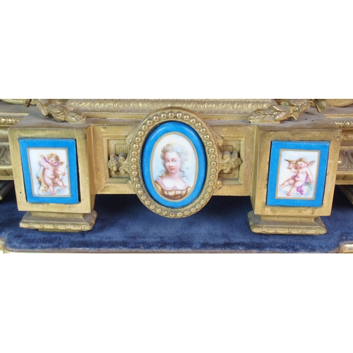 464 - A Louis XV style gilt metal mantle clock