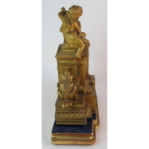 464 - A Louis XV style gilt metal mantle clock