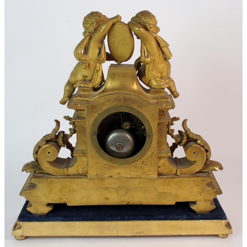 464 - A Louis XV style gilt metal mantle clock