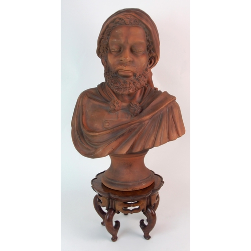 467 - A terracotta portrait bust of a Moor