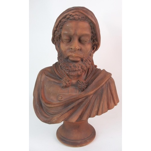 467 - A terracotta portrait bust of a Moor