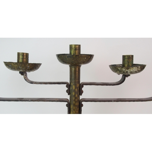 471 - A Coburg style hammered copper and wrought iron four branch candelabra