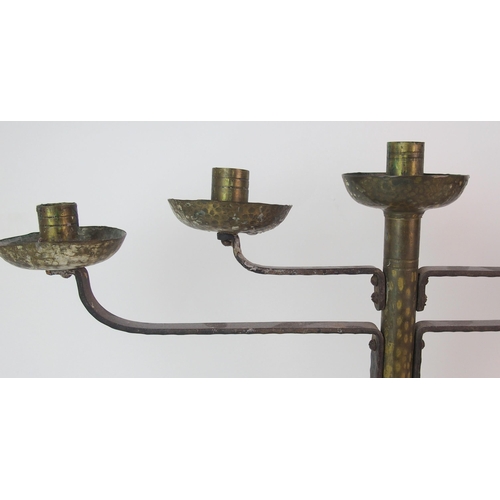 471 - A Coburg style hammered copper and wrought iron four branch candelabra