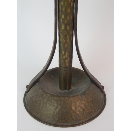 471 - A Coburg style hammered copper and wrought iron four branch candelabra