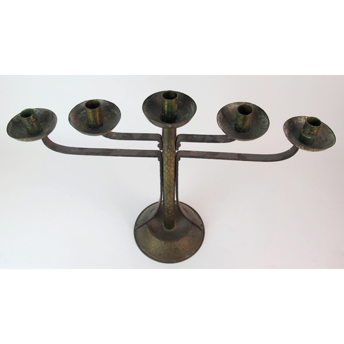 471 - A Coburg style hammered copper and wrought iron four branch candelabra