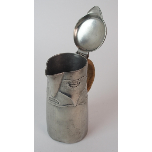 490 - Archibald Knox for Liberty & Co. Tudric Pewter lidded pots and a flower vase circa 1905