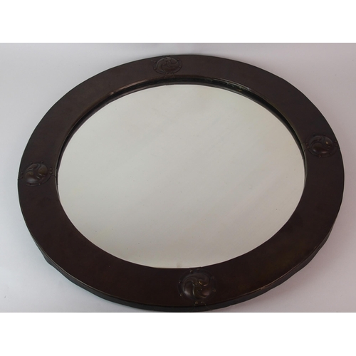 494 - A Liberty & Co. circular patinated copper brass mirror