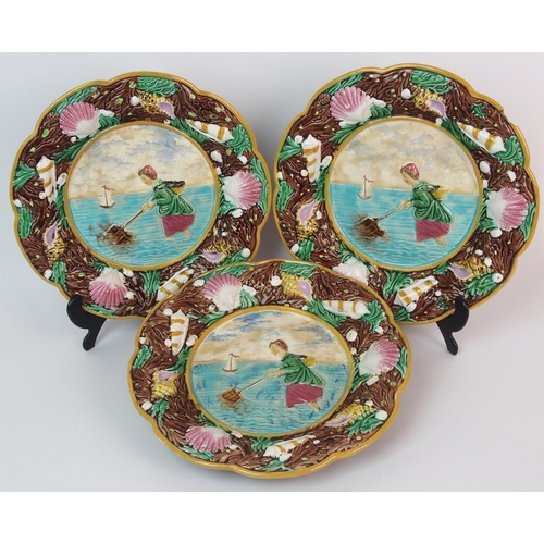 496 - Three George Jones majolica relief moulded plates