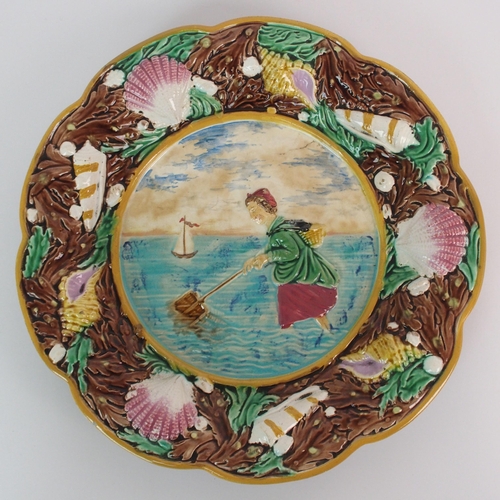 496 - Three George Jones majolica relief moulded plates