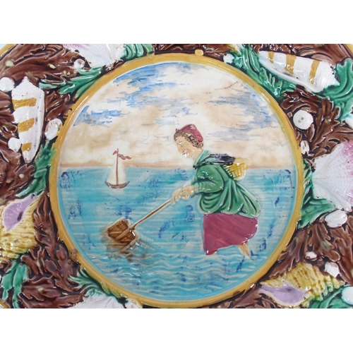 496 - Three George Jones majolica relief moulded plates