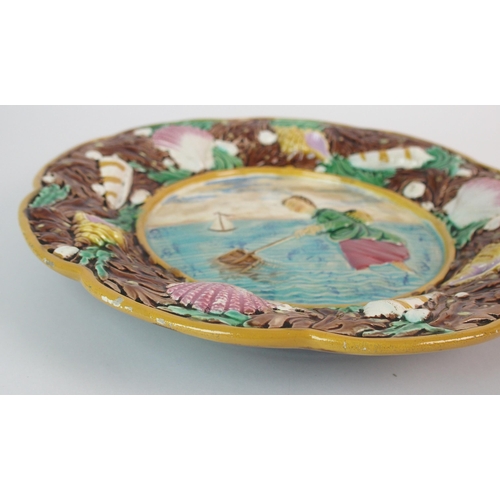 496 - Three George Jones majolica relief moulded plates