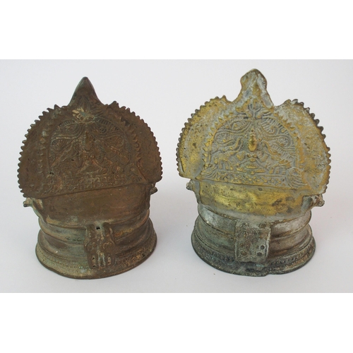 50 - A pair of Tibetan brass altar lamps