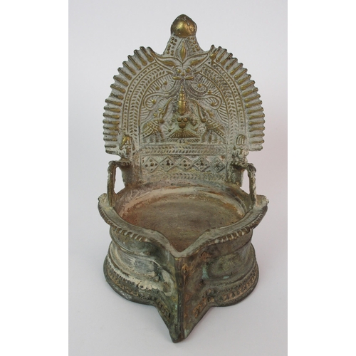 50 - A pair of Tibetan brass altar lamps