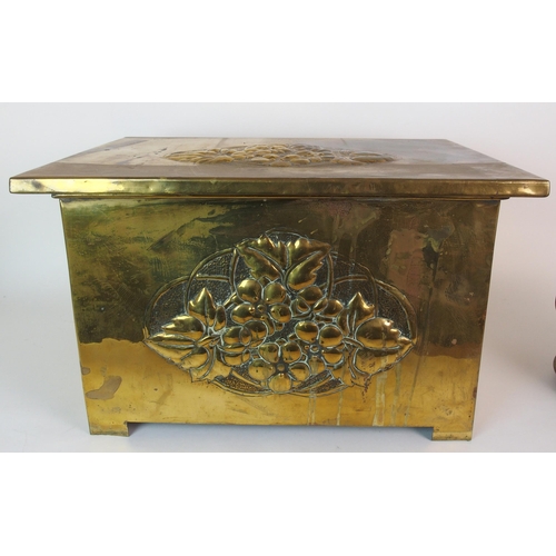 506 - A Glasgow School Arts and Crafts brass repousse work log box