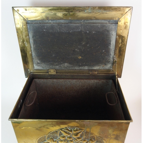 506 - A Glasgow School Arts and Crafts brass repousse work log box