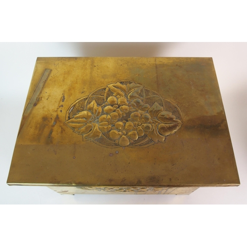 506 - A Glasgow School Arts and Crafts brass repousse work log box