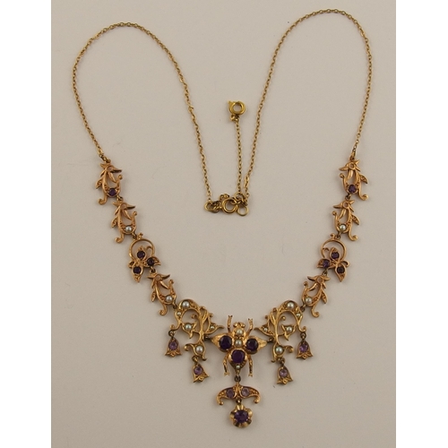 553 - A 9ct amethyst set bee necklace