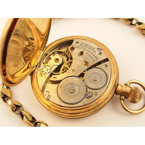 555 - A 9ct gold Waltham pocket watch