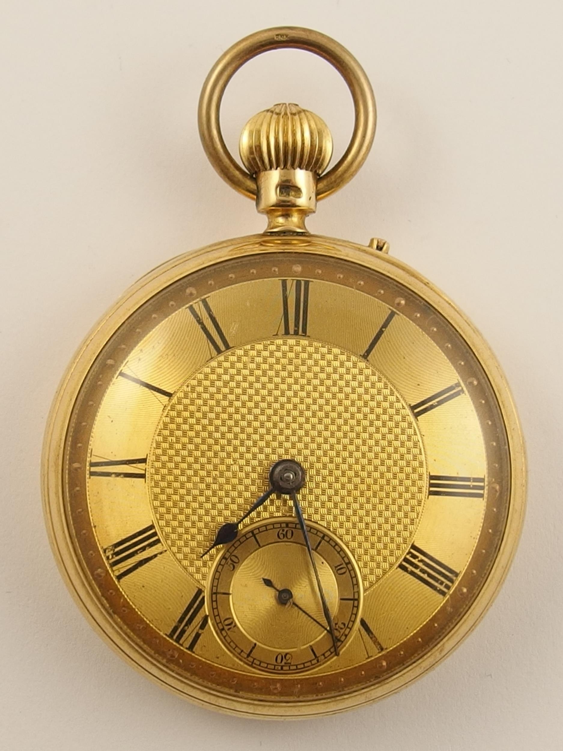 An 18ct open face pocket watch by H.J Butcher of Wellingborough
