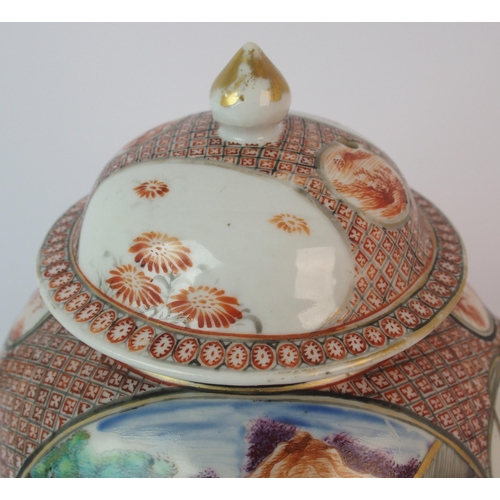 63 - A Cantonese famille rose globular teapot and cover