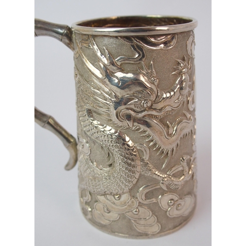 67 - A Chinese silver tankard