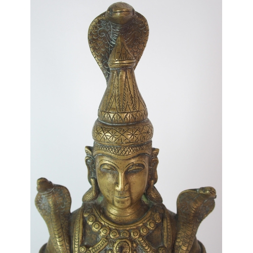 73 - A Burmese brass figure of a snake god