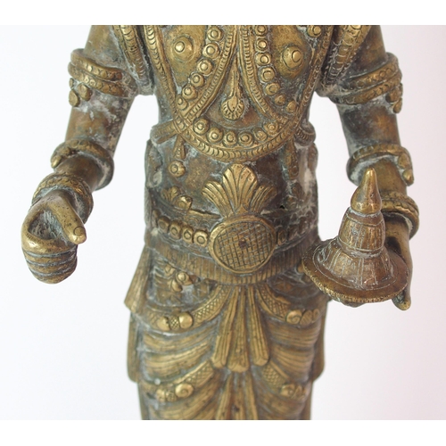 73 - A Burmese brass figure of a snake god