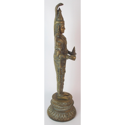 73 - A Burmese brass figure of a snake god