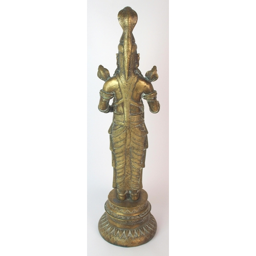 73 - A Burmese brass figure of a snake god