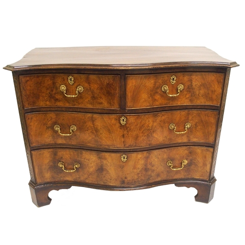 762 - A George III style mahogany serpentine chest