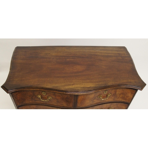 762 - A George III style mahogany serpentine chest