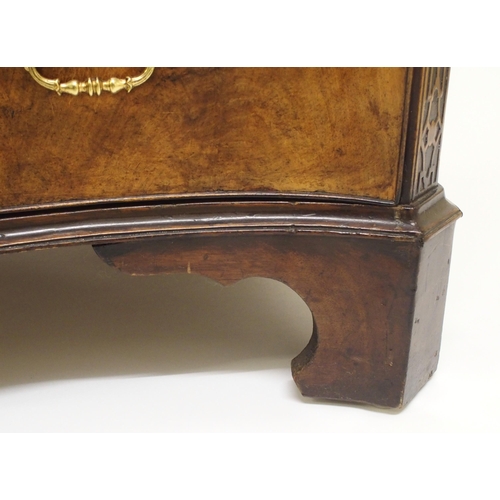 762 - A George III style mahogany serpentine chest