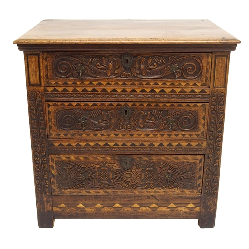 764 - An oak panelled chest