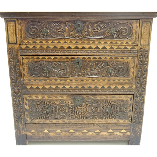 764 - An oak panelled chest