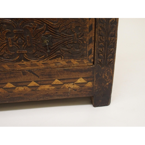 764 - An oak panelled chest