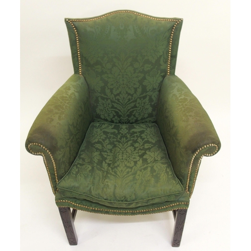 766 - A George III upholstered and brass studded wing armchair