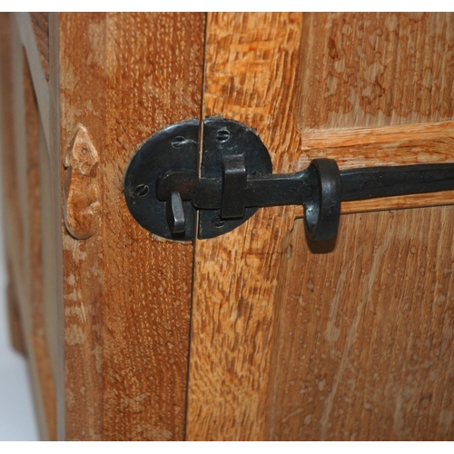 828 - ROBERT 'MOUSEMAN' THOMPSON An oak bedside cupboard