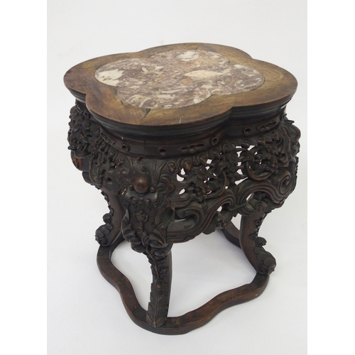 837 - A Chinese carved hardwood pedestal