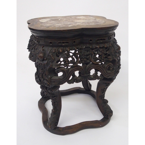 837 - A Chinese carved hardwood pedestal