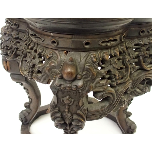 837 - A Chinese carved hardwood pedestal