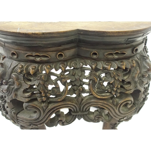 837 - A Chinese carved hardwood pedestal