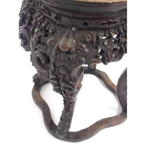 837 - A Chinese carved hardwood pedestal