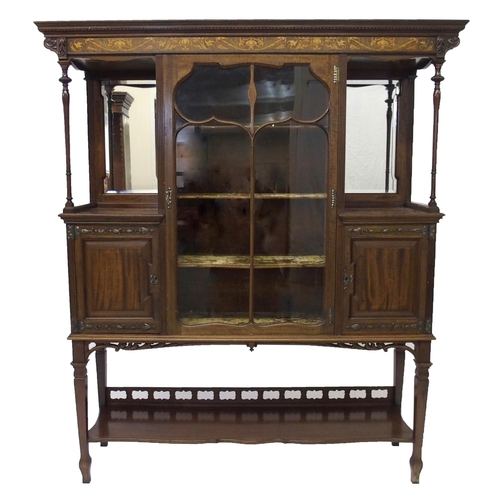 838 - An Arts and Crafts mahogany and foliate inlaid display cabinet