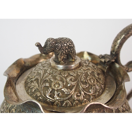 84 - An Indian silver teapot and cover