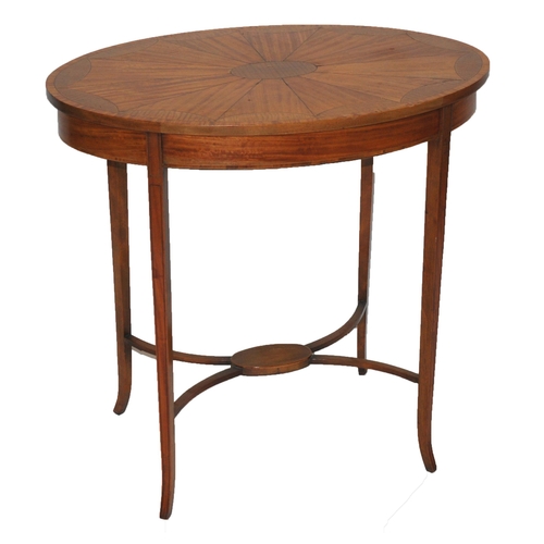 845 - An Edwardian satinwood and ebony strung oval occasional table