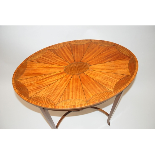 845 - An Edwardian satinwood and ebony strung oval occasional table